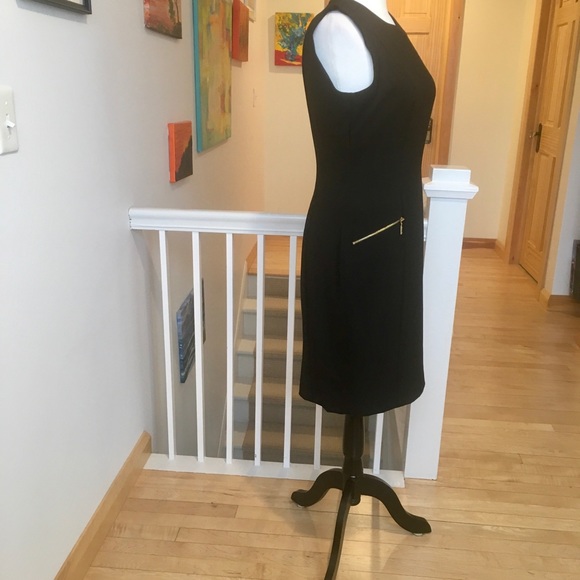 Lovely Calvin Klein black fitted dress, with gold accent pockets. - Picture 4 of 16